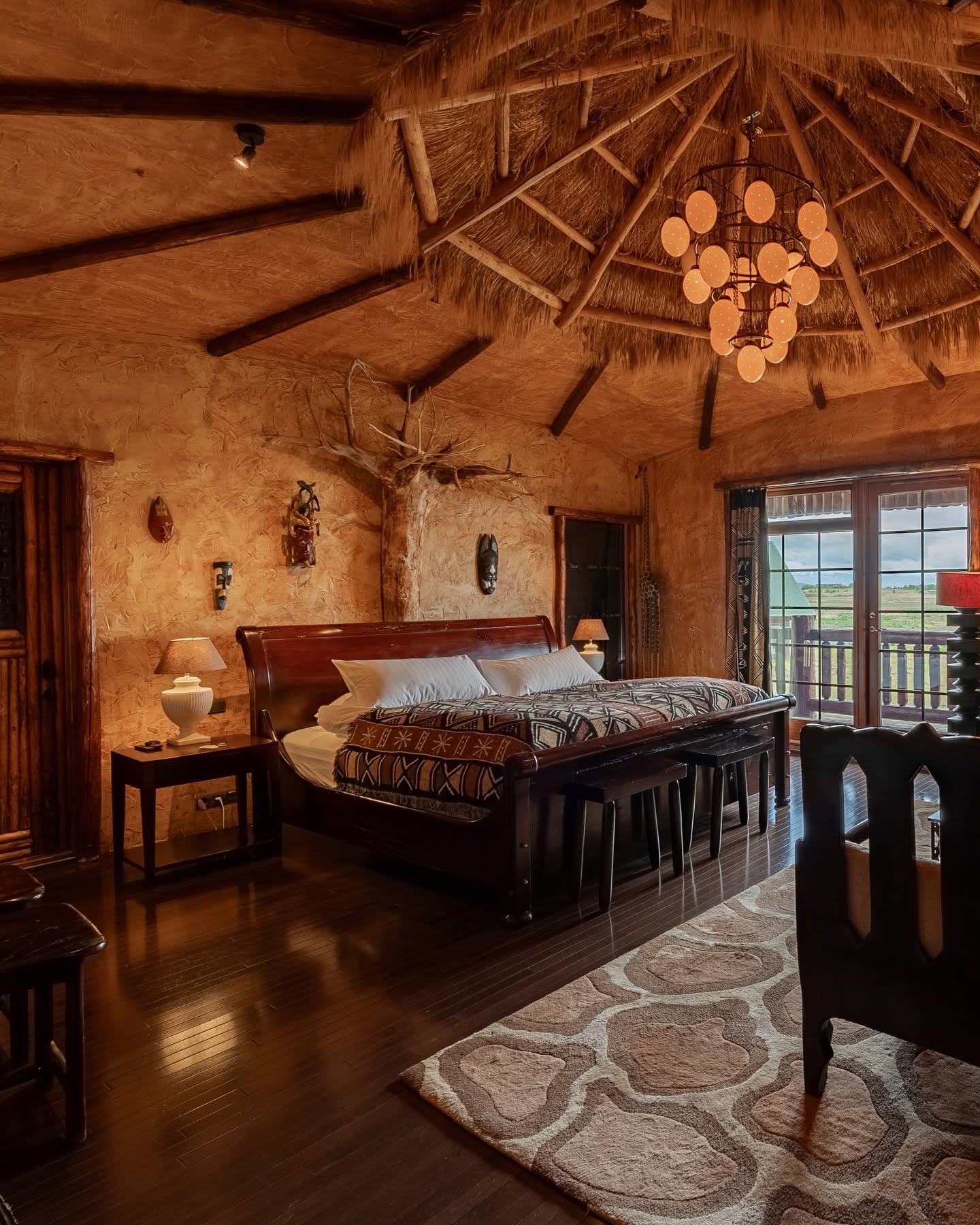 Themed suite at Hotel Rangá in Hella with a thatched conical ceiling and warm timber interior